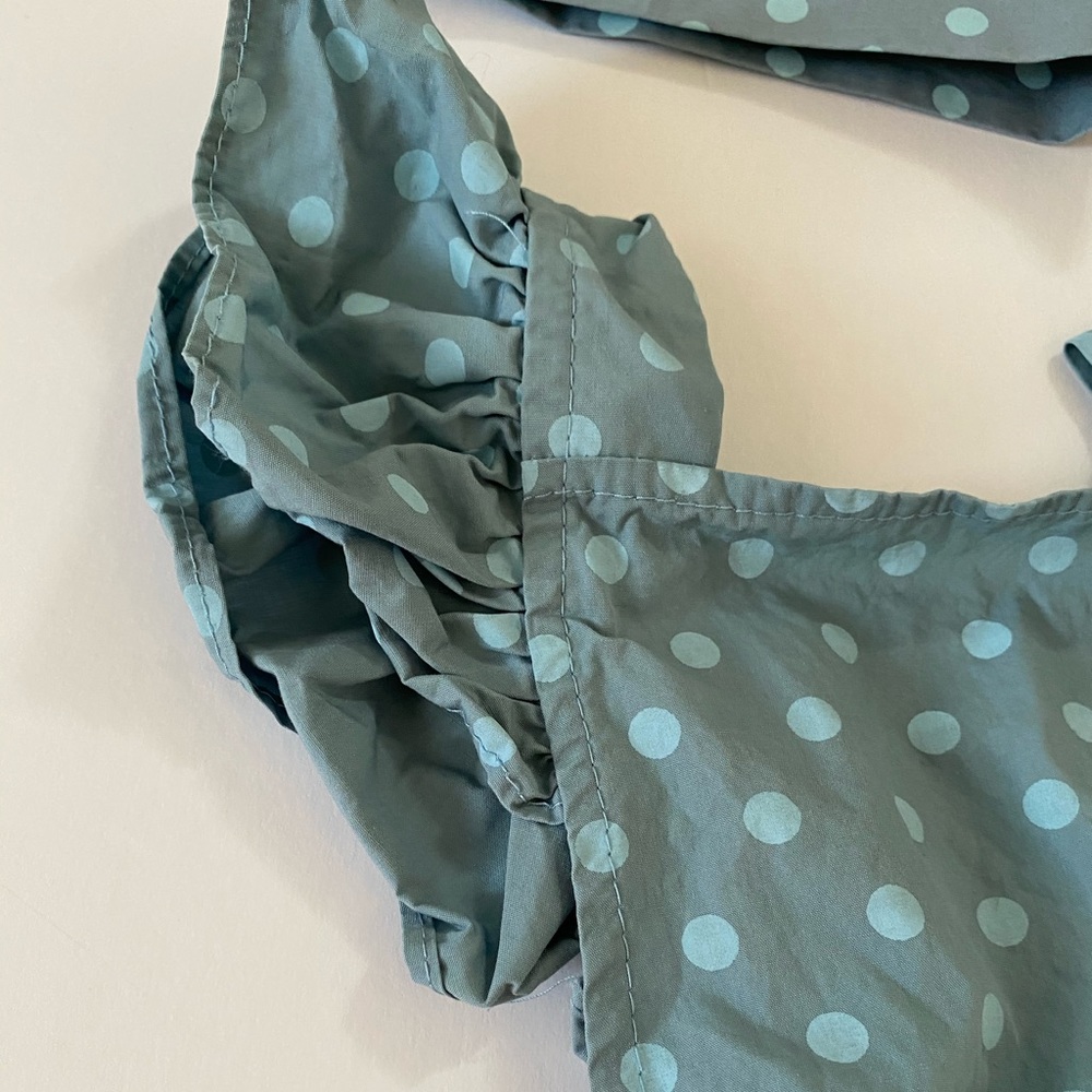 Blue polka dot onesie with matching headband